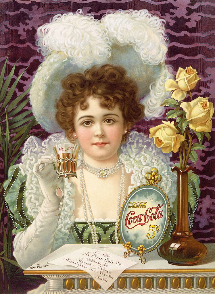 A young white woman in elaborate 19th century costume delicately holds a glass of coca-cola in a gloved hand. Infront of her is a vase of roses and an oval sign saying "Drink Coca-Cola 5 cents.