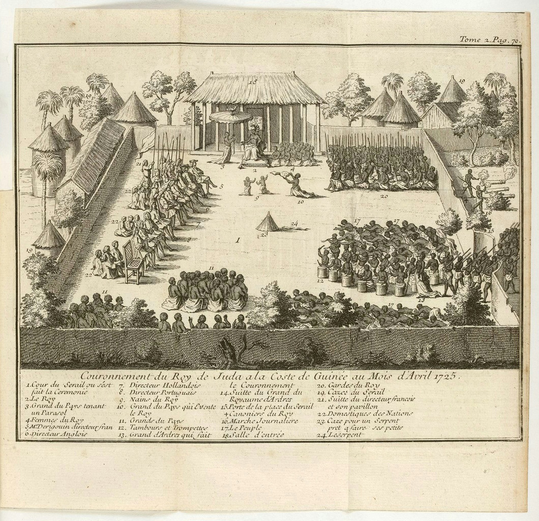 A woodblock print of a walled enclosure in front of a large building with columns. In the courtyard are lots people arranged in different seated and standing groups for the coronation of King Juda in 1725. Out side the enclosure are other buildings, most with conical roofs indicating a large settlement. 