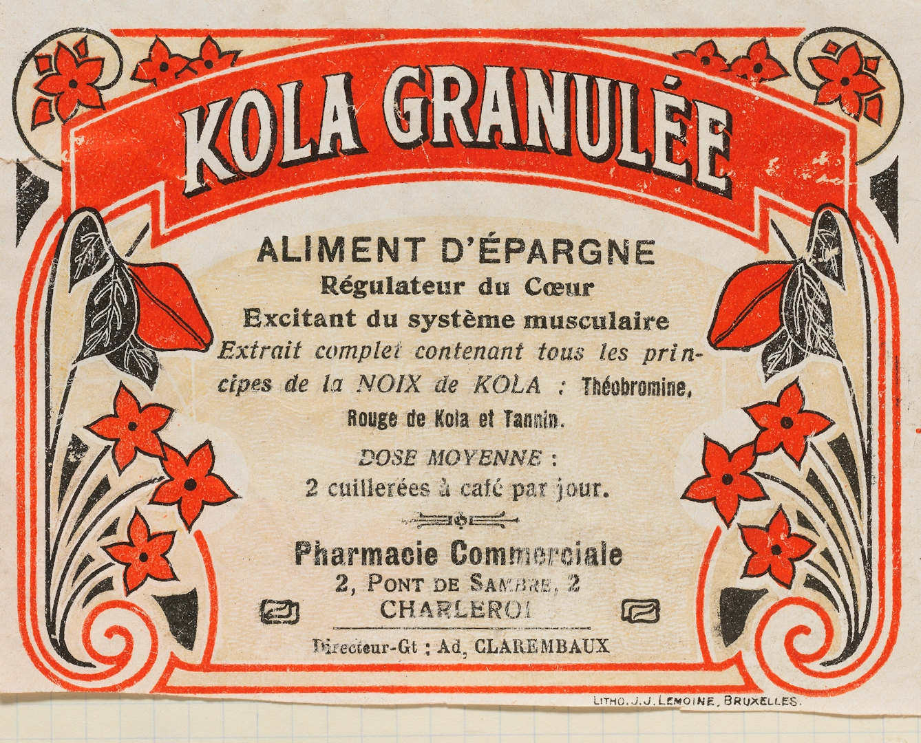 An eye-catching label for Kola Granulee, a Belgian pharmaceutical product containing kola nut extract. 'Kola Granulee' is written in in a banner at the top and the text below of its uses and ingredients is surounded by a decorative floral border. At the bottom are the manufacturer's details: "Pharmacie Commerciale, Charleroi".