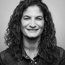 Black and white, head and shoulders photographic portrait of Damaris Cooke.