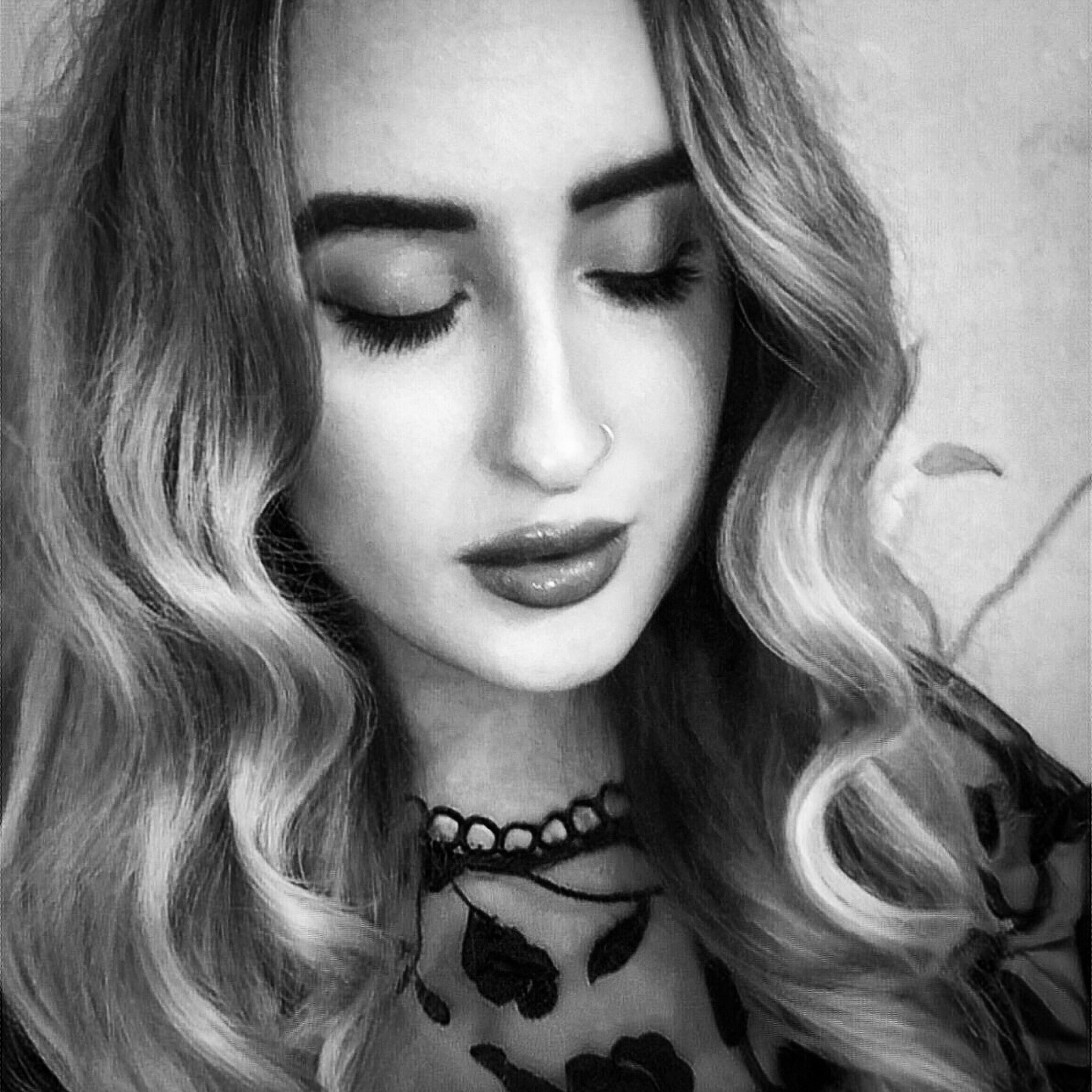 Black and white headshot of Kimberley Burrows.