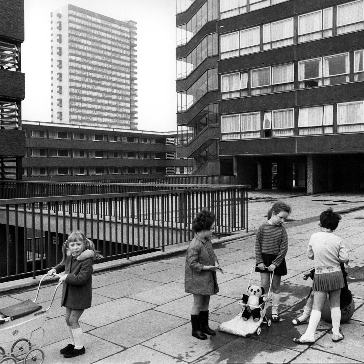 Image of children playing on a raised walkway in Deptford, London