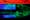 Photograph of part of a wine bottle shot under UV lighting which has reviewed finger prints. Due to the UV lighting the colours in the image are predominantly green and blue. A scale rule in the image has turned bright red.