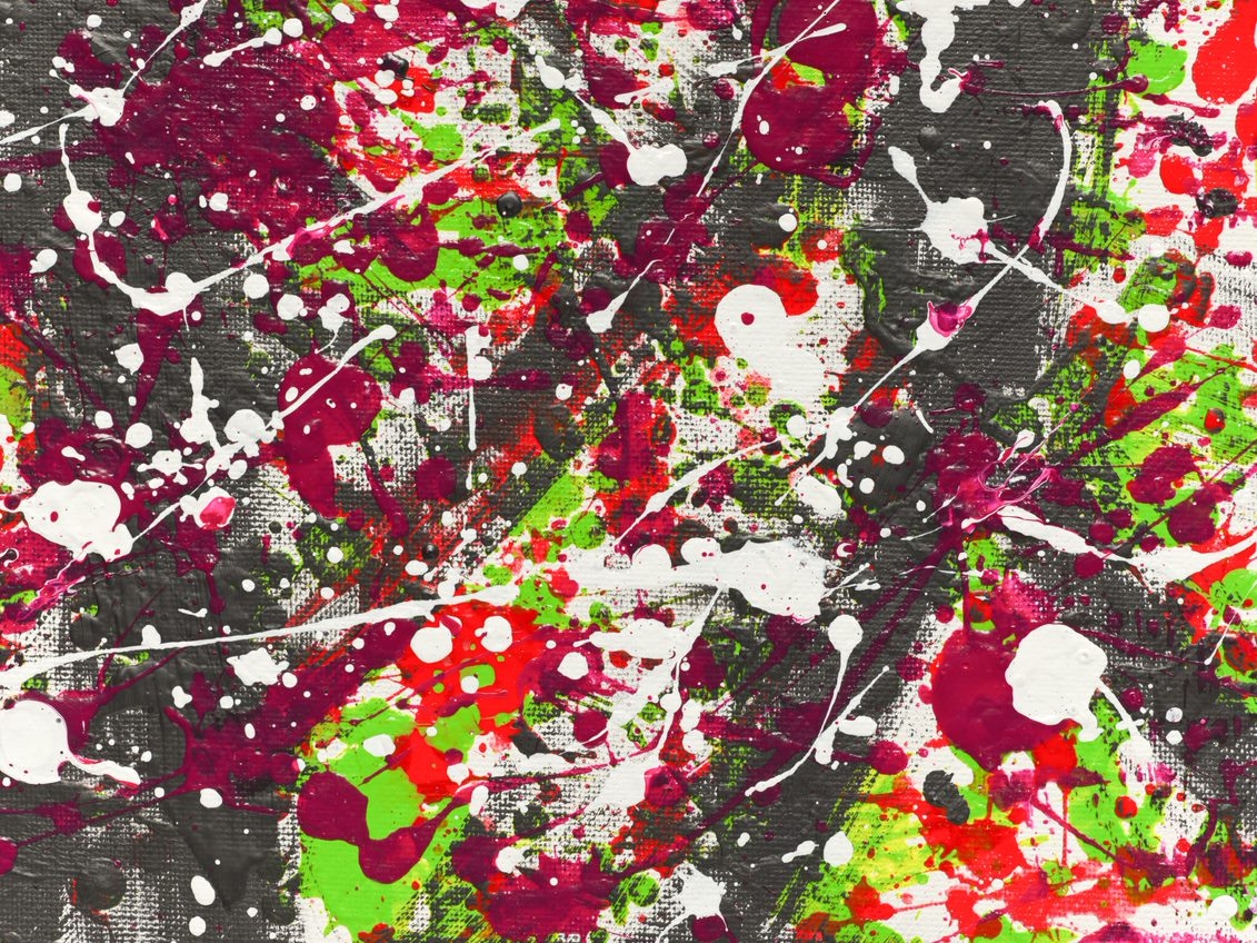'Power' (2022) is an abstract expressionist acrylic on canvas painting, in landscape orientation. Splatters and strings of neon green, bright red, hot pink, and white rain down a dry textured black. The painting has a grungy, distressed, immediate, loose and chaotic appearance.