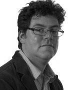 Black and white, head and shoulders portrait of Professor David Turner