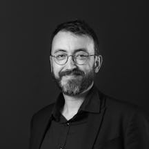 A headshot of Olivier Calcada