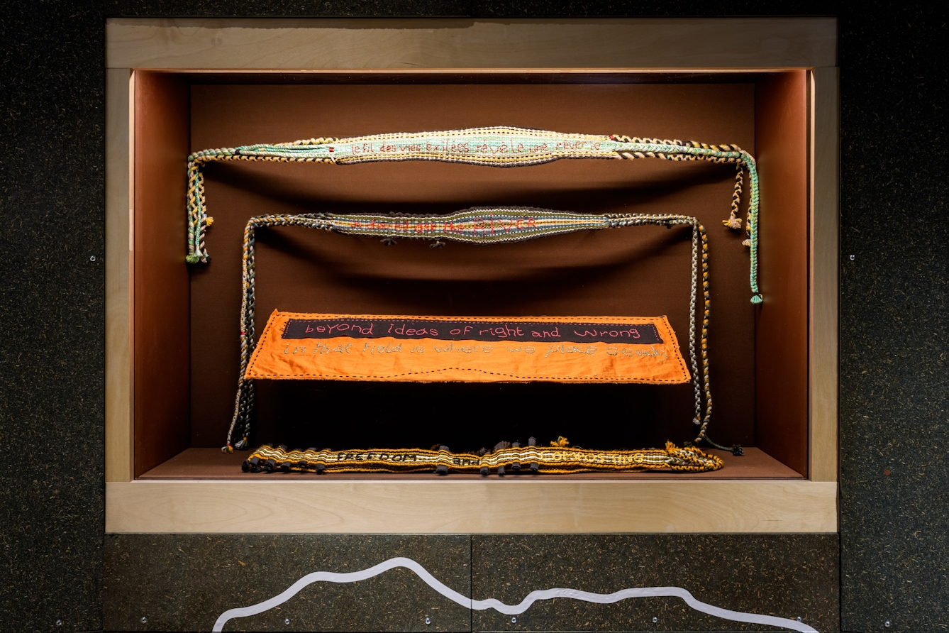 Four woven prayer belts.