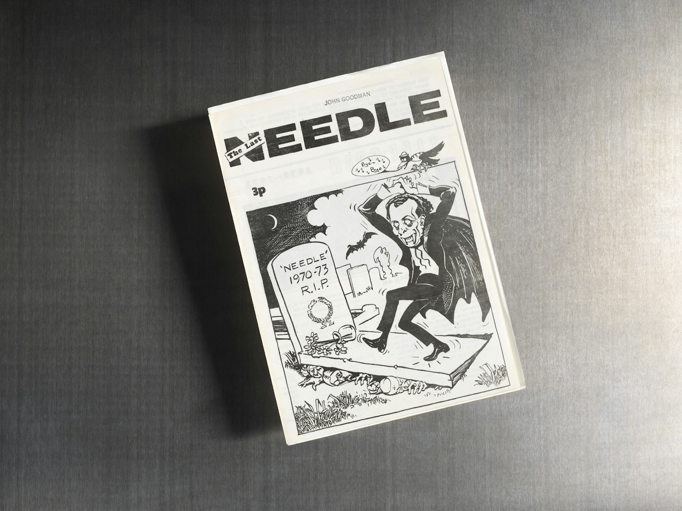 A black and white comic-style drawing on the cover of a publication titled "The Last Needle." It shows a vampire dancing on a grave with a tombstone that reads "'Needle' 1970-73 R.I.P." A bat flies in the background, and a crow perched nearby says, "Bye, Bye!" The cover also mentions the name John Goodman and a price of "3p." The grave has skeleton hands and heads reaching out from beneath it.