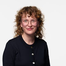 A headshot of Grace Higgins Brown smiling into the camera
