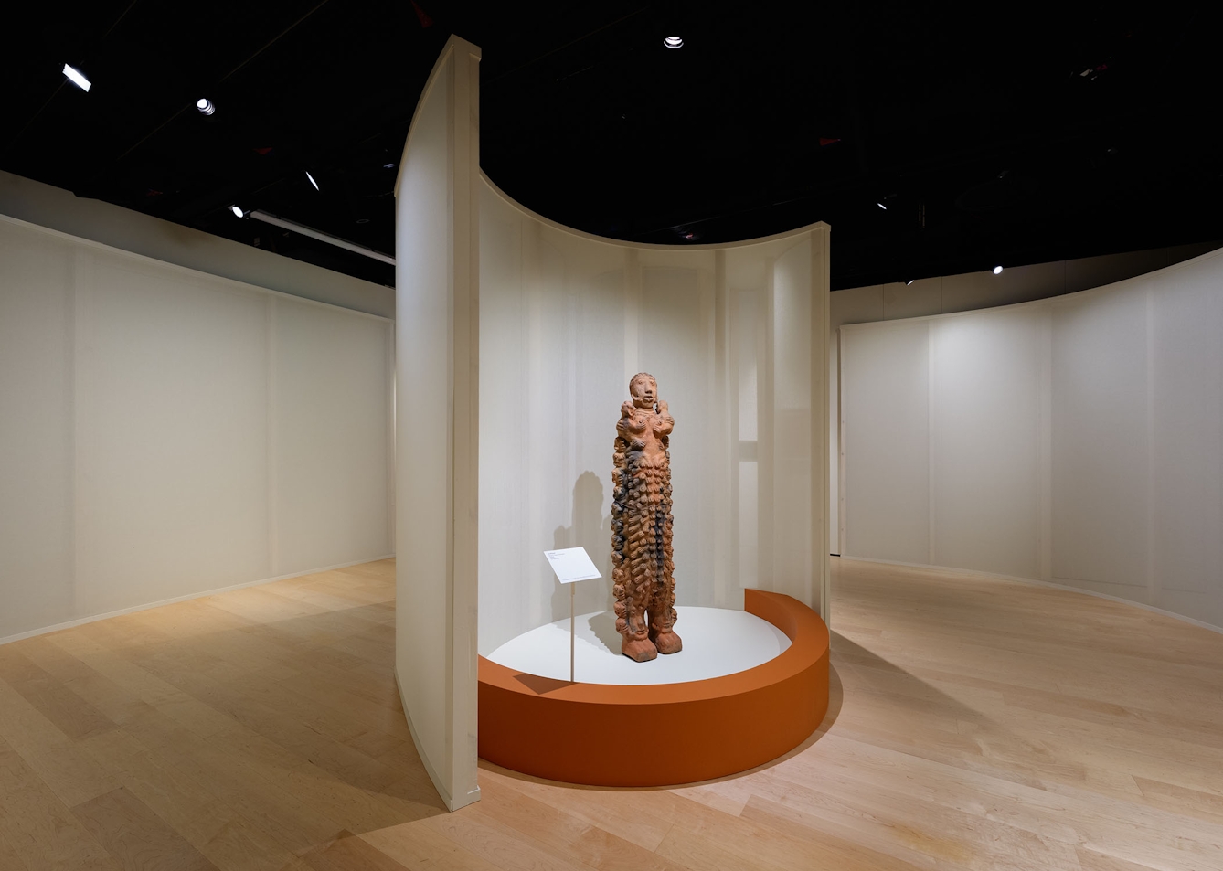 A large terracotta sculpture of a standing figure. 'Untitled' by Seyni Awa Camara, 2008