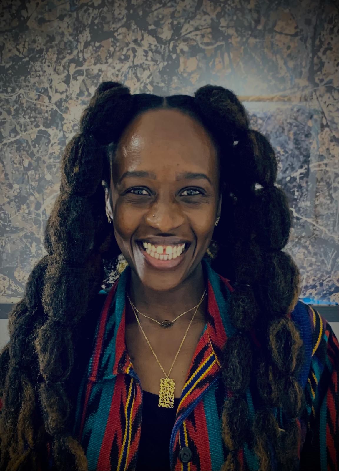 A headshot of Jumana 