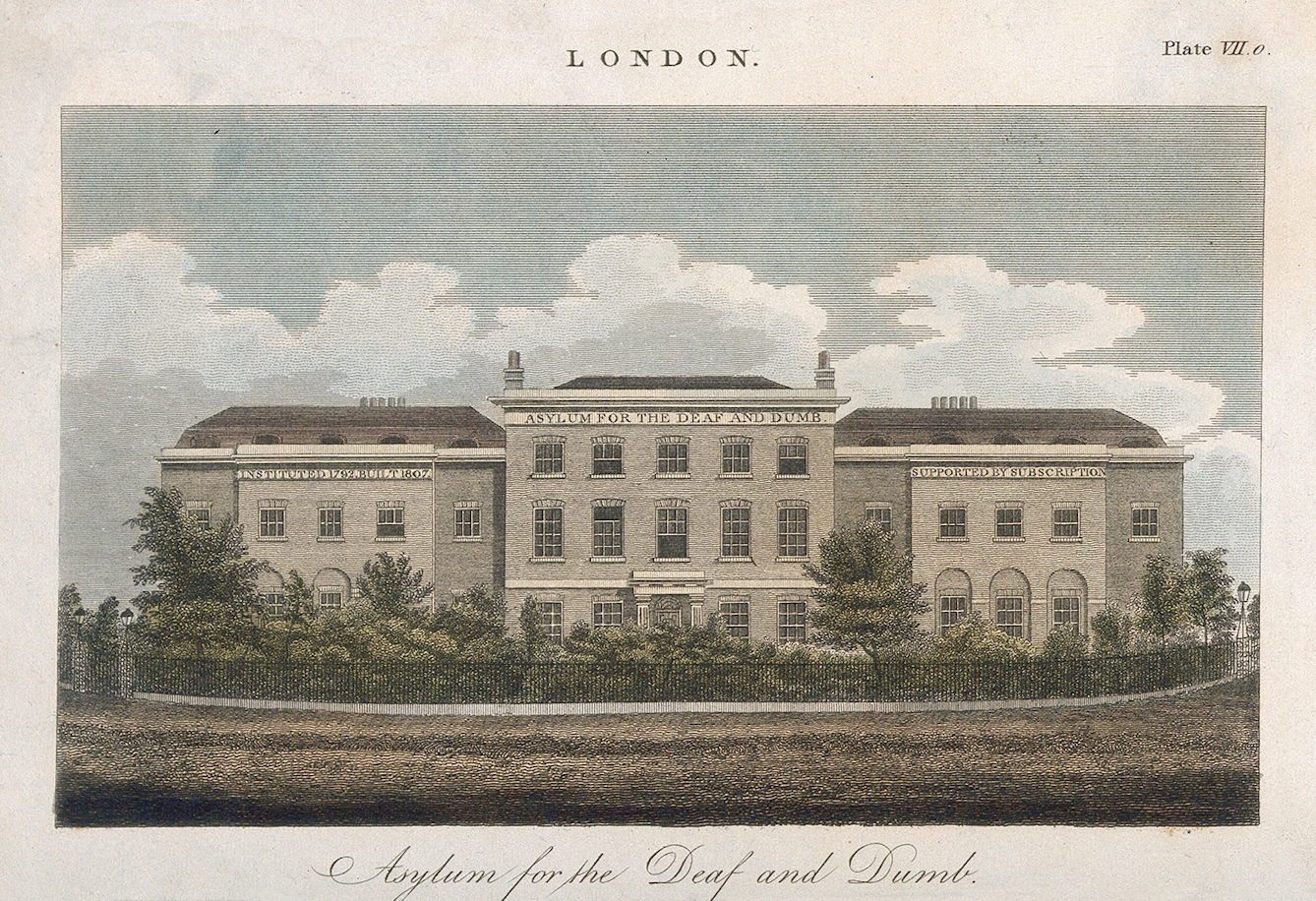 Coloured engraving of a large 19th century stone building with a three storey central section, flanked by a 2 storey wing on either side.Lettering on the front of the building, immediately below the roof says: "Instituted 1792, built 1807. Asylum for the Deaf and Dumb. Supported by subscription." In front of the building is a garden of small trees and shrubs, encircled by iron railings.