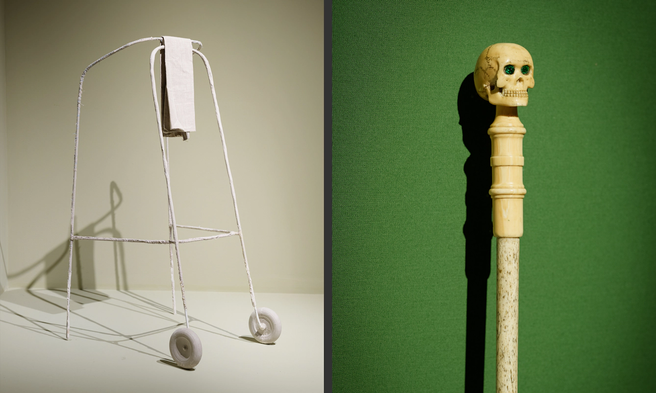 On the left is a fragile white Zimmer frame with a white cloth folded over the front. On the right is a walking cane made of bone with a skull on the top, against a green background.