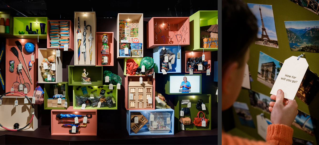 Colourful boxes are filled with miscellaneous objects, with labels hanging off them.