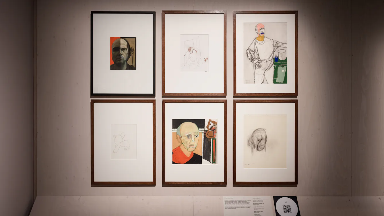 A wall of six framed self‑portraits by artist William Utermohlen.