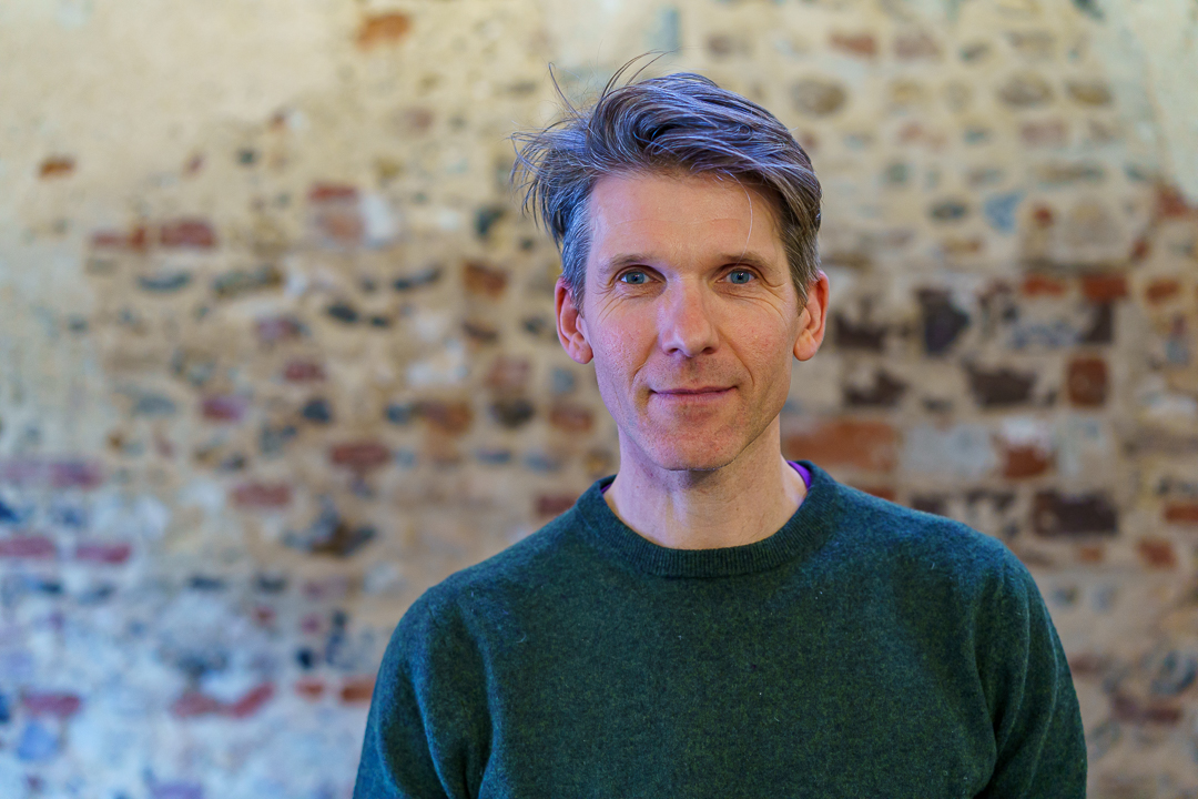 A headshot of Fearghus