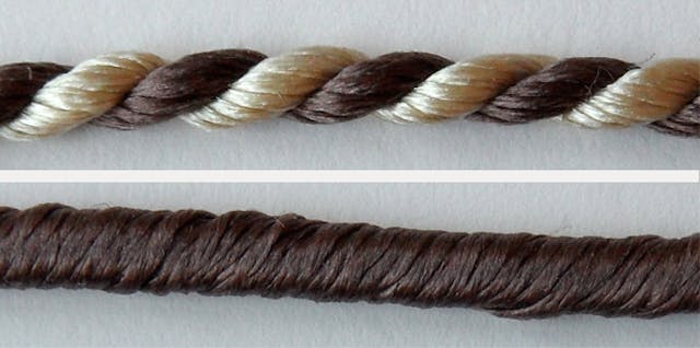 Diptych photograph showing two close-ups of embroidery thread. The top image shows a two-ply thread, made up of twisted brown and cream thread. The bottom image shows a brown gimp thread. 