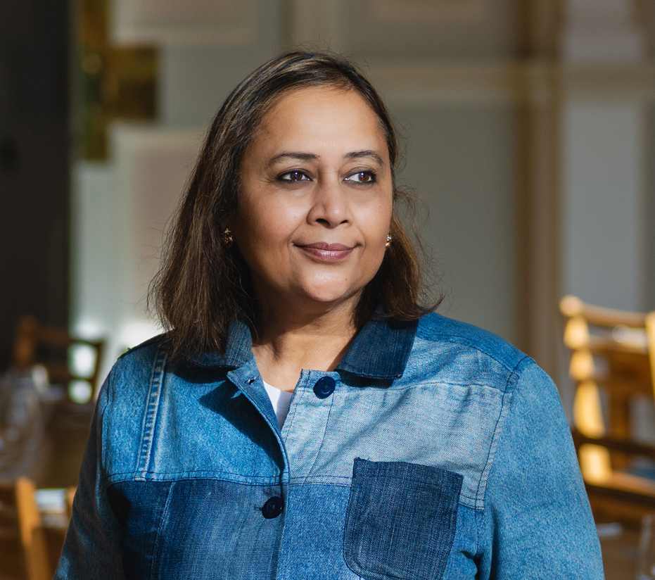 Photo of Pragya Agarwal in a denim shirt.