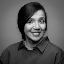 Black and white, head and shoulders portrait of Rubbena Aurangzeb-Tariq.