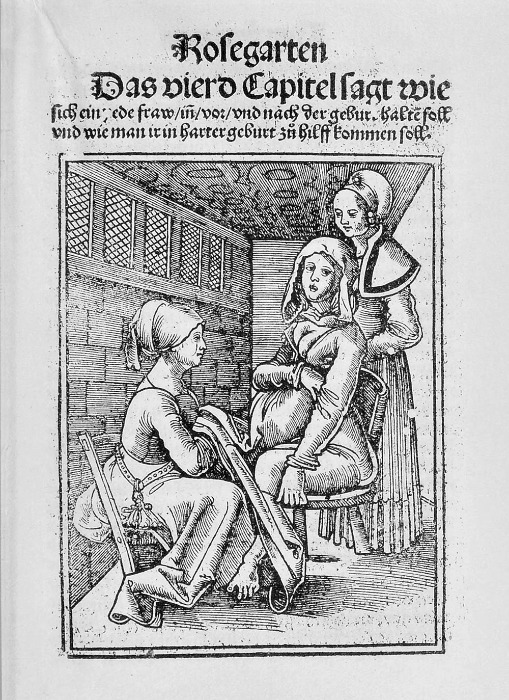 Two medieval women assist another woman in giving birth on a birthing chair, one woman is standing and supports her from behind, the other is seated in front raising the woman's skirts. 