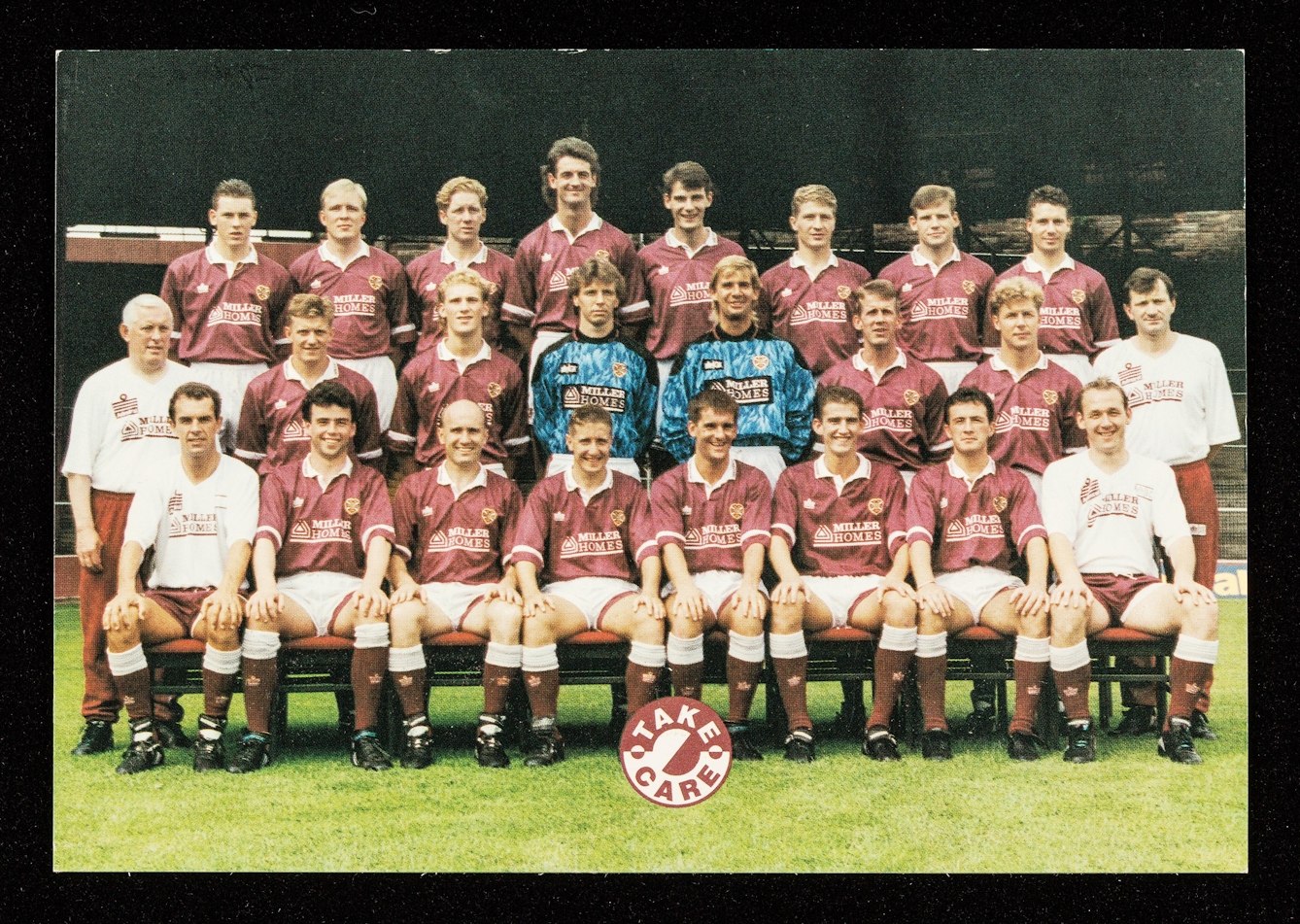 Colour photograph of a 1990s Lothian Football team with a circular graphic logo at the bottom centre of the image that says "Take Care" in the team colours of maroon and white. 