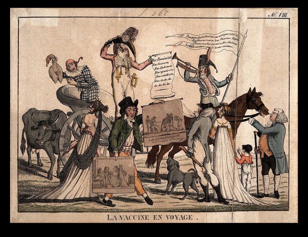 The image shows a procession of people protesting the introduction of vaccines in 19th century France.  One man rides a horse and plays a trumpet. One woman rides a chariot. They carry banners and flags about the vaccines. 