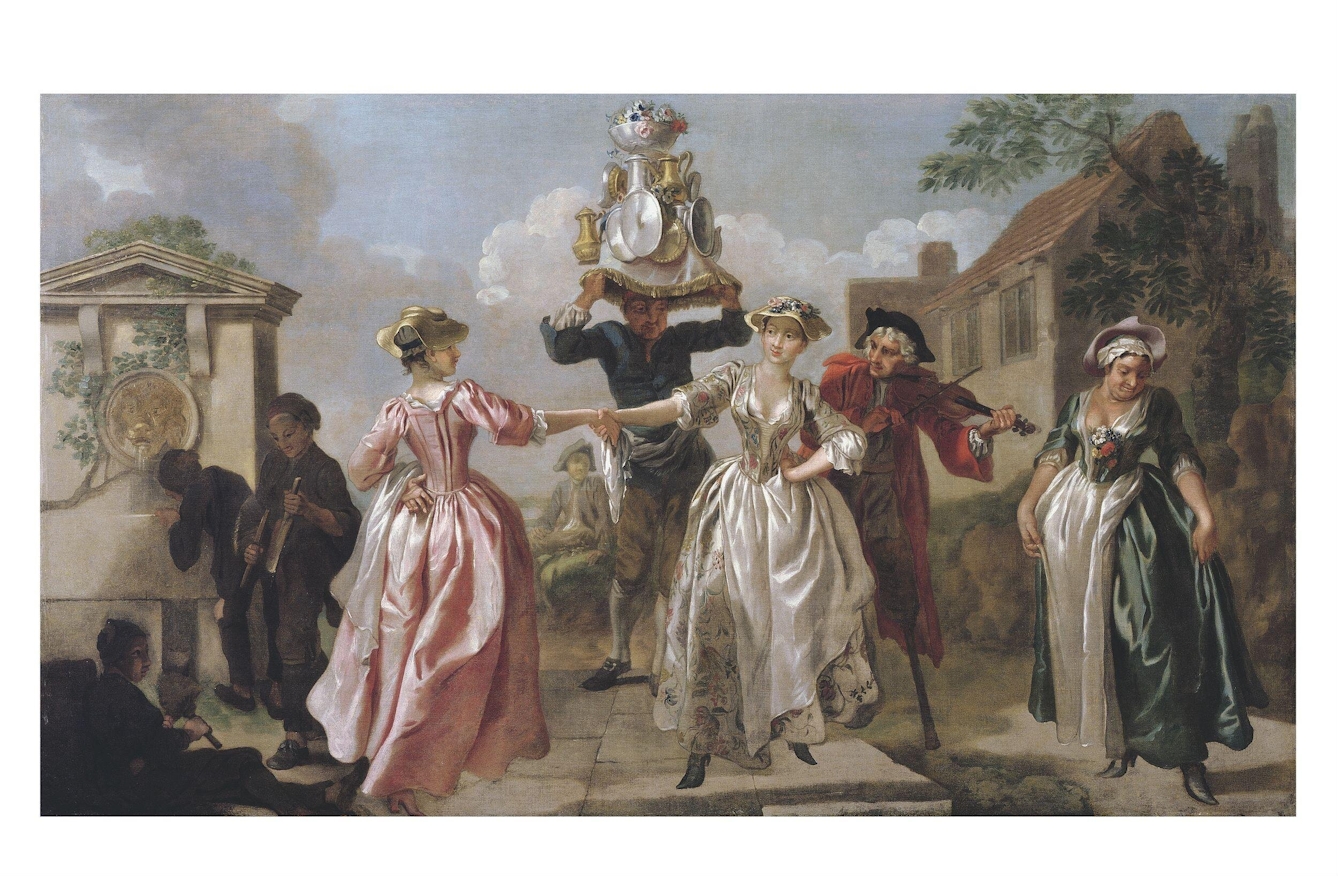 Painting of two young women who are milkmaids holding each other's right hand and dancing around. Behind them, a man plays the fiddle and another carries a large garland on his head, made from milking churns and jugs with flowers atop. Onlookers gaze at their finery and one drinks from a fountain. In the background are trees, houses and a blue sky edged with clouds.