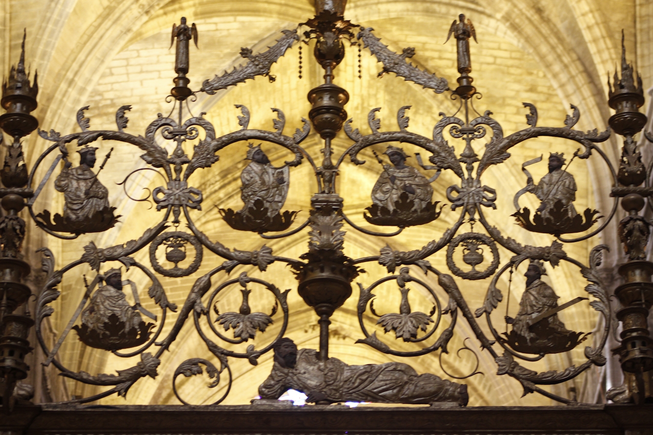 Colour photograph of a wrought metal Choir's grille depicting the Tree of Jesse (family tree of Jesus). 