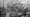 Monochrome photo of polluted city landscape
