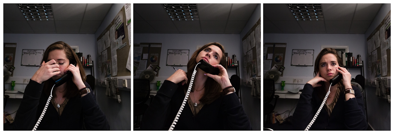 Photographic triptych showing the same woman in each image, sat in an office environment. In the left hand image the woman holds a landline telephone receiver to her left ear, her right hand scratches her nose and her eyes are closed. In the middle image she holds the receiver to her left ear and her head is tilted upwards, looking towards the ceiling. In the right hand image she holds the receiver to her left ear and is looking into the distance over the top of the camera.