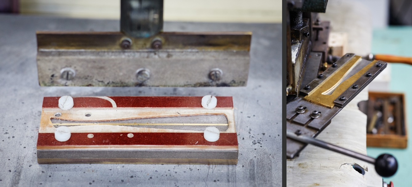 Photographic diptych. The image on the left shows a piece of machinery resting on a worktop. The rectangular form has a mould in the centre for the arm of a pair of spectacles. The image on the right shows a similar mould but on a different piece of machinery.
