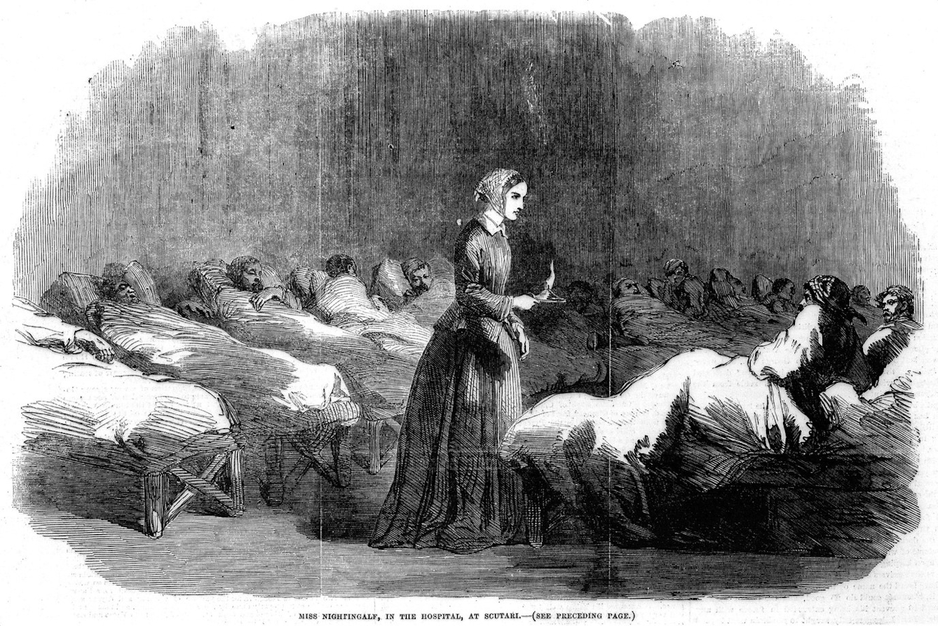 A black and white wood engraving of Florence Nightingale, surrounded by patients in hospital beds.