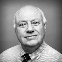 Photographic, black and white, head and shoulders portrait of Alan D Murray.