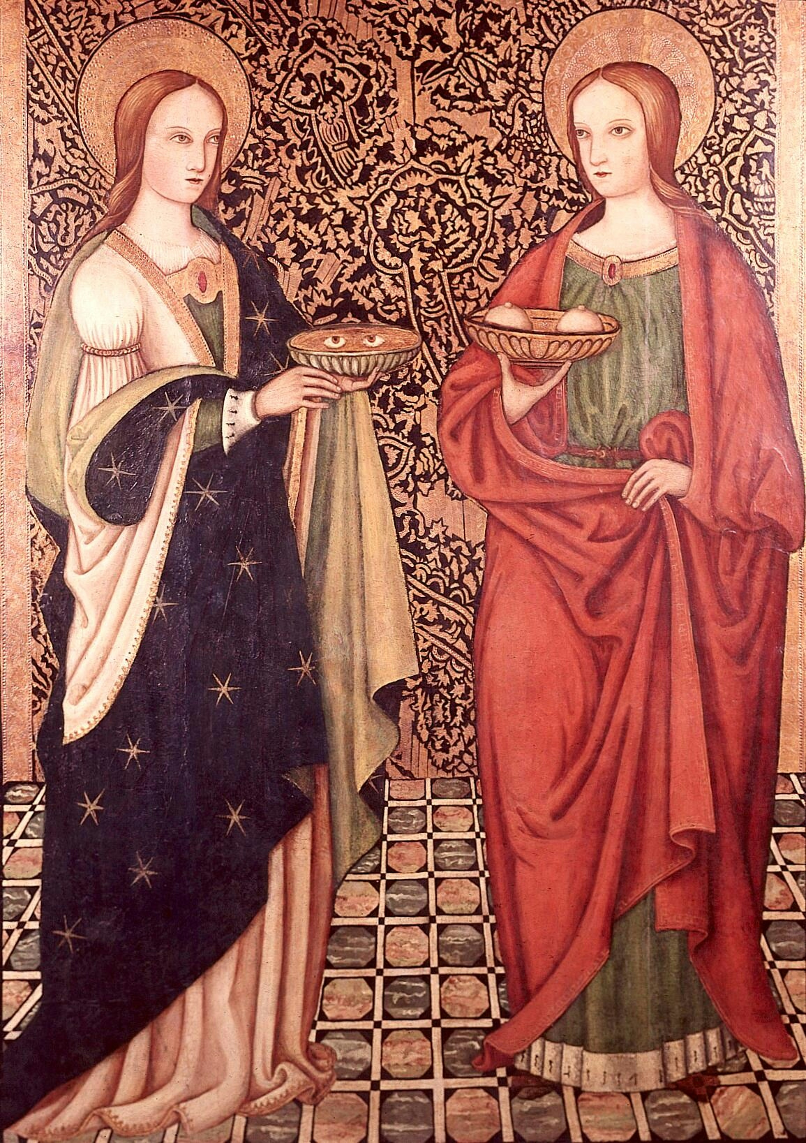 Colour image of an oil painting of St Lucy, holding a platter bearing her eyes, and St Agatha, holding a platter bearing her breasts. These were the body parts that the women had removed during their martyrdom. 