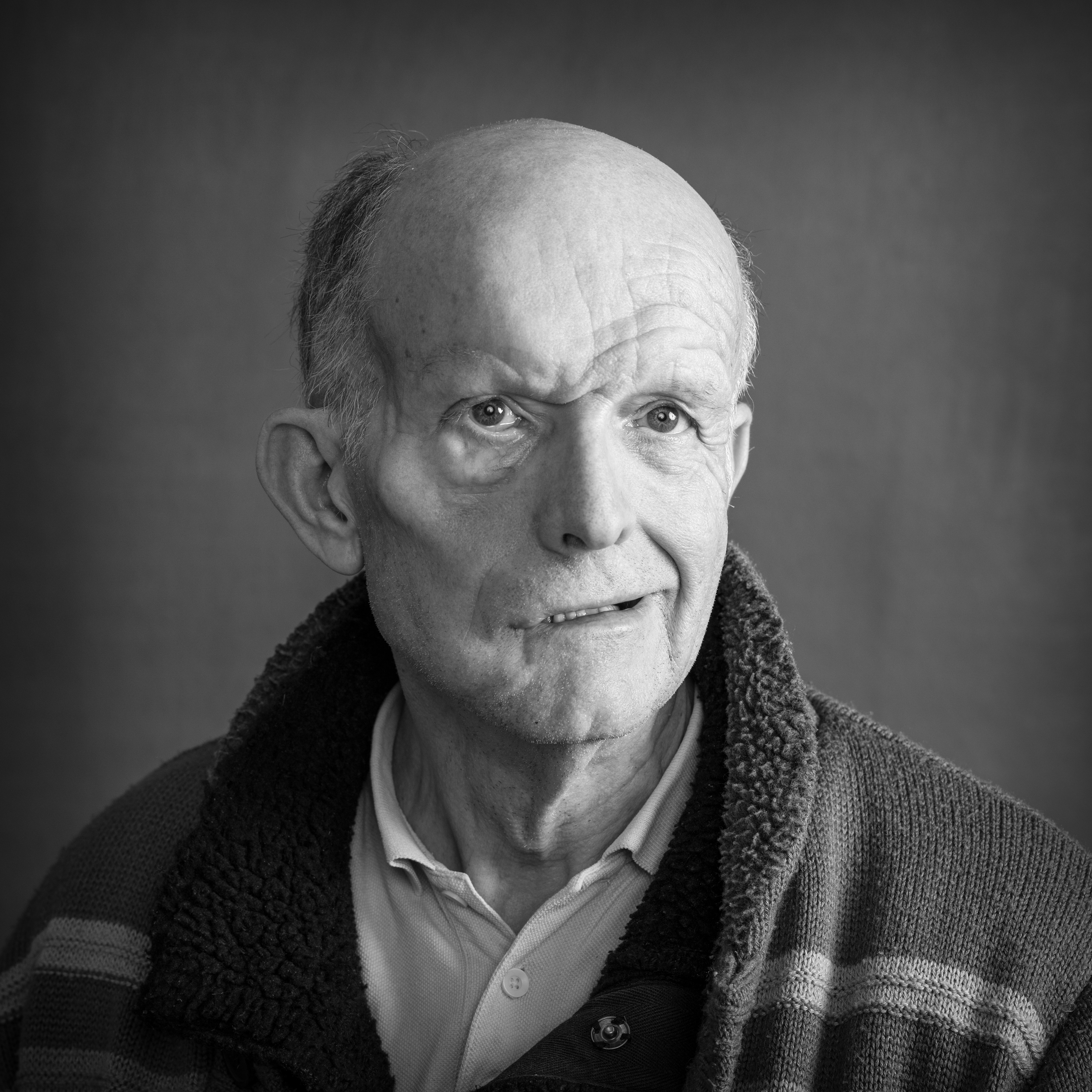 Black and white, head and shoulders portrait of Chris Miller.