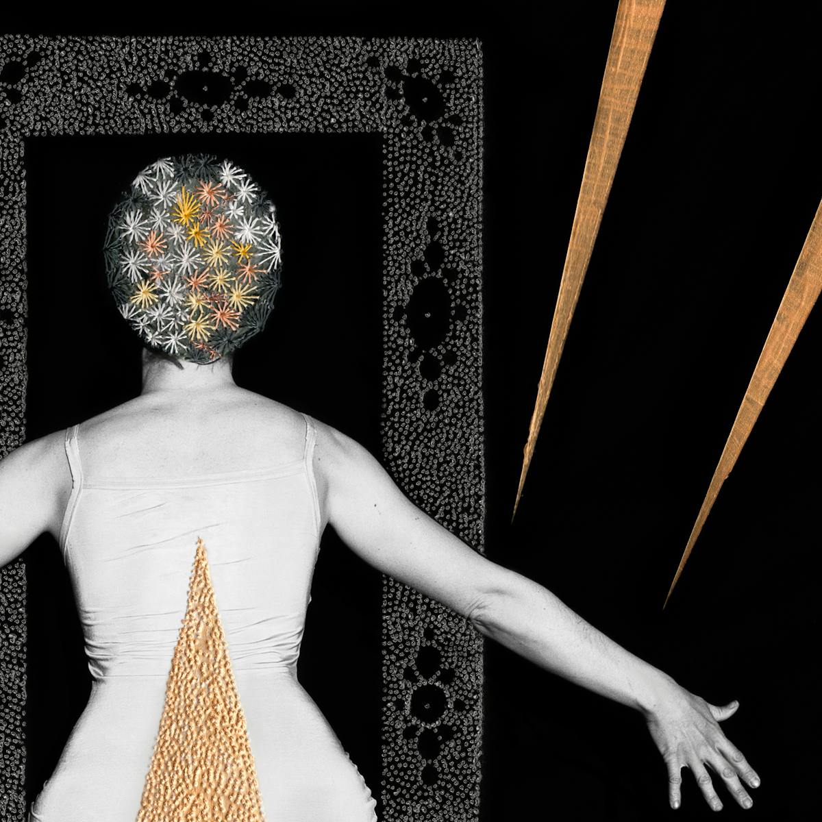 Artwork made up of a black and white photograph of a female figure from behind, from the waist up, against a black background. Her arms are held out straight to either side, her fingers are outstretched. Embroidered into the photographic print with yellow and orange coloured thread is a crisscross floral pattern which exactly covers her head and hair. Across her back, in a copper coloured textured paint is a large  triangle. In front of the figure is a large rectangular frame made up of a layered texture of grey dots which forms a doorway. Either side of the figure are long copper coloured shards made in metallic paint which seem to be reaching out to tether her arms.