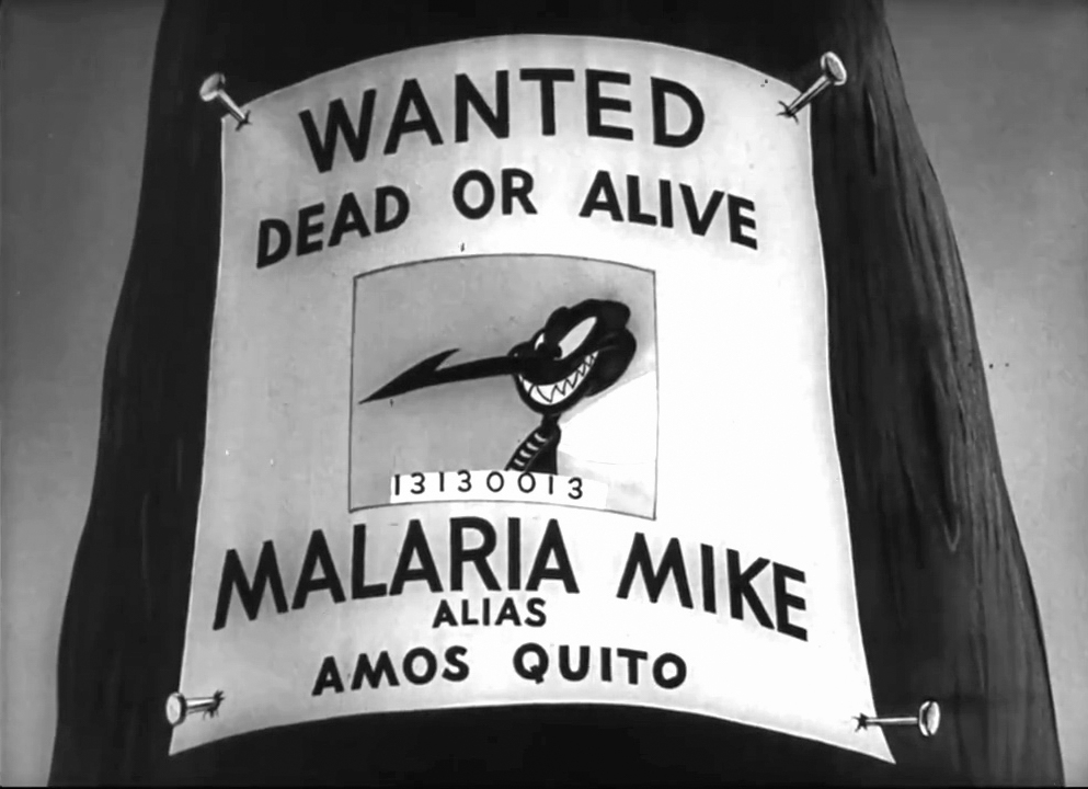 Black and white still image from the film 'Private SNAFU vs. Malaria Mike', showing a 'Wanted' poster nailed to a tree.  There is a head and shoulders mug shot of Malaria Mike with the serial number 13130013 below.  Text on the poster reads 'WANTED DEAD OR ALIVE MALARIA MIKE ALIAS AMOS QUITO.'