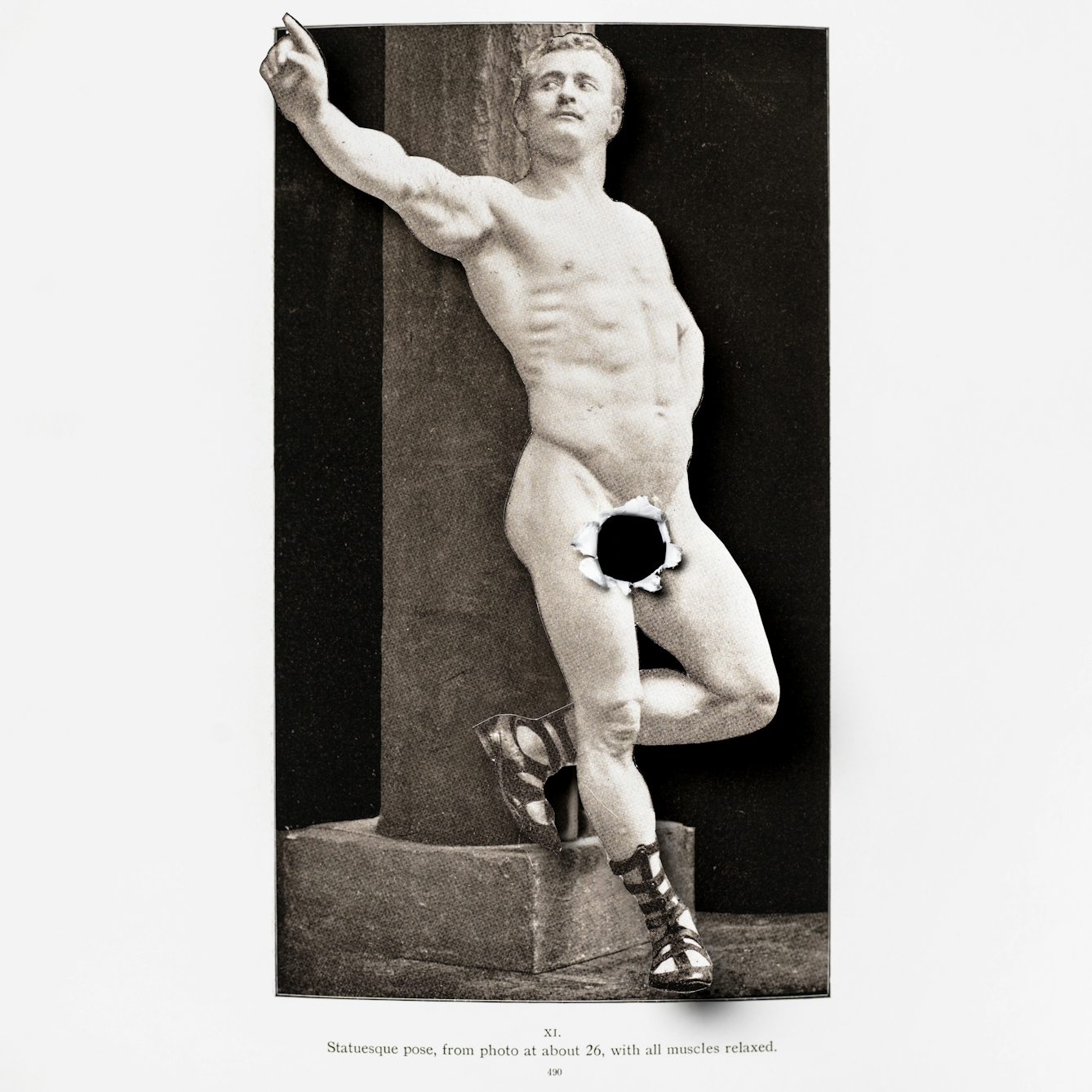 Photograph of a photograph of a naked man where the body of the man has been cut out and lifted above the background. Where the man's genitals should be there is a black hole with the torn edges folded forwards.