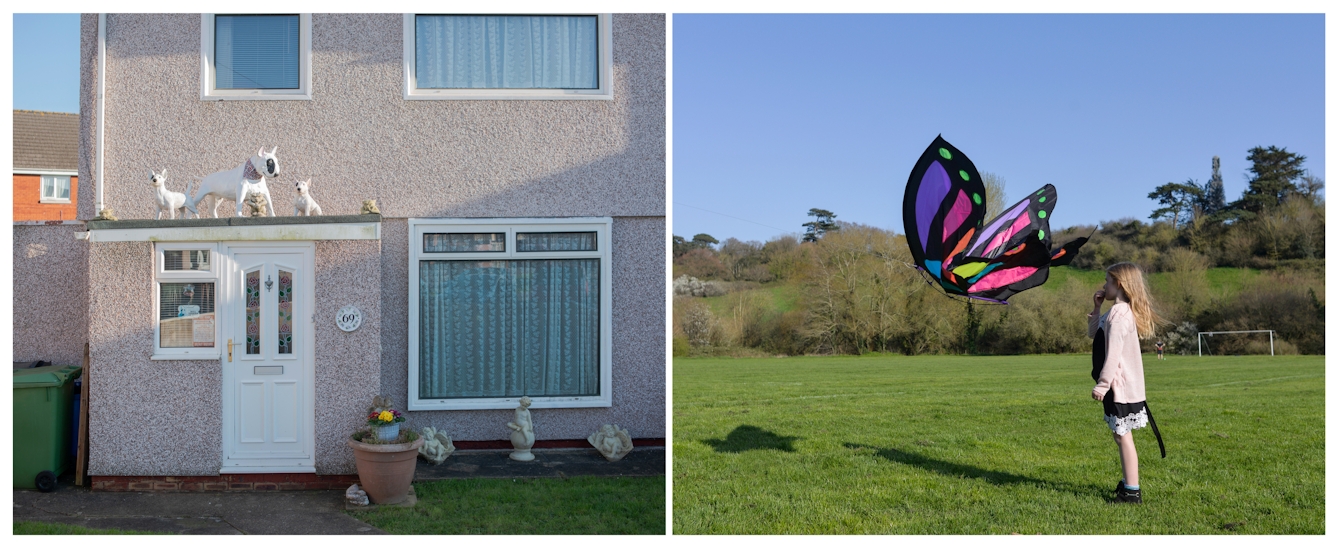 A photographic diptych. The image on the left shows a grey pebbledash house with white PVC door and windows. On top of a porch are three models of white bull terriers with black eye patches. The larger life size bull terrier, wears a purple neckerchief. There are other smaller stone ornaments on the porch roof and in the garden below including water babies or cherubs, as well as a terracotta flowerpot beside the door. The image on the right shows a young girl standing on the right of the image in a playing field with a goal post, a slight hill and trees beyond. The girl stands side on looking out to the left of the image. A short distance in front of her face is a large colourful butterfly kite.  Both the girl and the kite cast shadows on the ground across the grass.