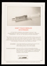 Poster with a large greyscale image of a syringe at the top and orange capitalised text saying "Don't touch needles or syringes". The black text below gives advice on what to do immediately and then as soon as possible. The City of Edinburgh District Council logo is at the bottom centre.