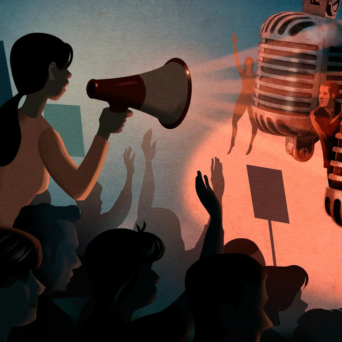 Illustration of a female figure on the left hand side who is rising up out of a larger crowd of people. She is holding a loudhailer to her mouth and speaking. The crowd are raising their hands in support, some hold placards. In front of the crowd are two over-scale broadcast microphones being held by 4 individuals pushing them slightly towards the crowd. The hues of the illustration are muted reds, blues and whites.