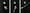 Photographic black and white triptych. The 3 images show a man standing against a dark grey wall holding a white cane in his hands. He is looking down towards the cane in his hands. Each image the cane being unfolded, from completely folded in the first image to completely assembled in the last.