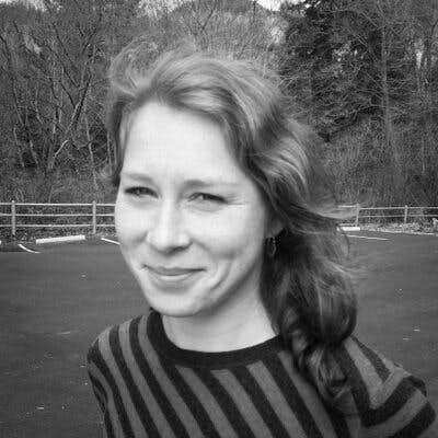 Black and white, head and shoulders portrait of Isabella Kaminski