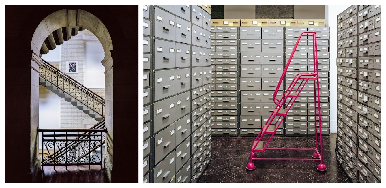 Photographic diptych. The image on the left shows a large stone archway inside a Victorian period building. The archway frames a view onto an ornate staircase rising up through the frame. The balustrades are made of case iron in intricate geometric and repeating patterns. The image on the right shows a storeroom, full of small drawer units, lining all sides of the room. Each drawer has a white label. The floor is a dark wood parquet, on which a large pinky red stepladder is parked. The ladder is on wheels and has a handrail.