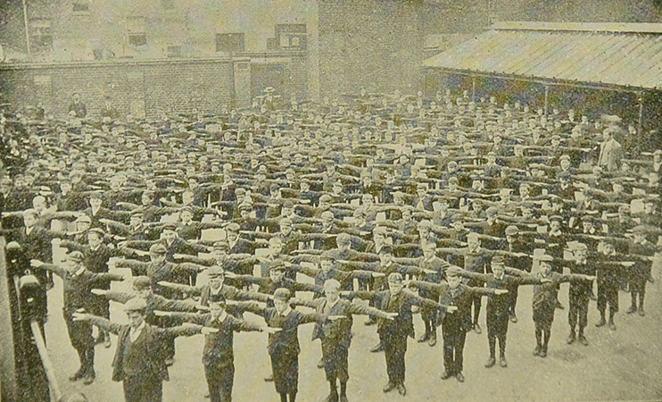 School children doing exwecise drills