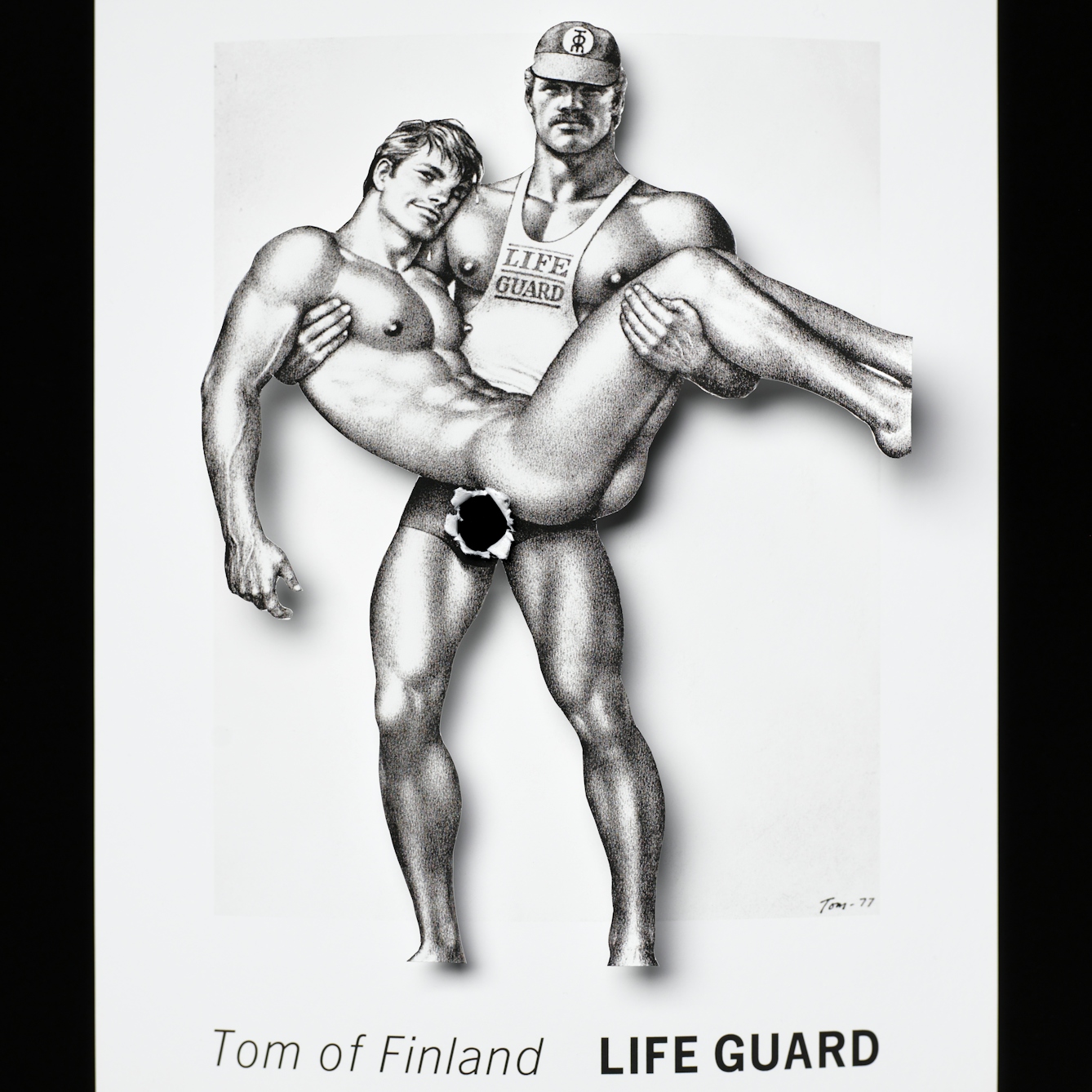 Photograph of an illustration of two men where the body of the men have been cut out and lifted above the background. Where one of the men's genitals should be there is a black hole with the torn edges folded forwards.