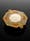 Image of octagonal shaped gold brooch with a bearded man in profile in the centre