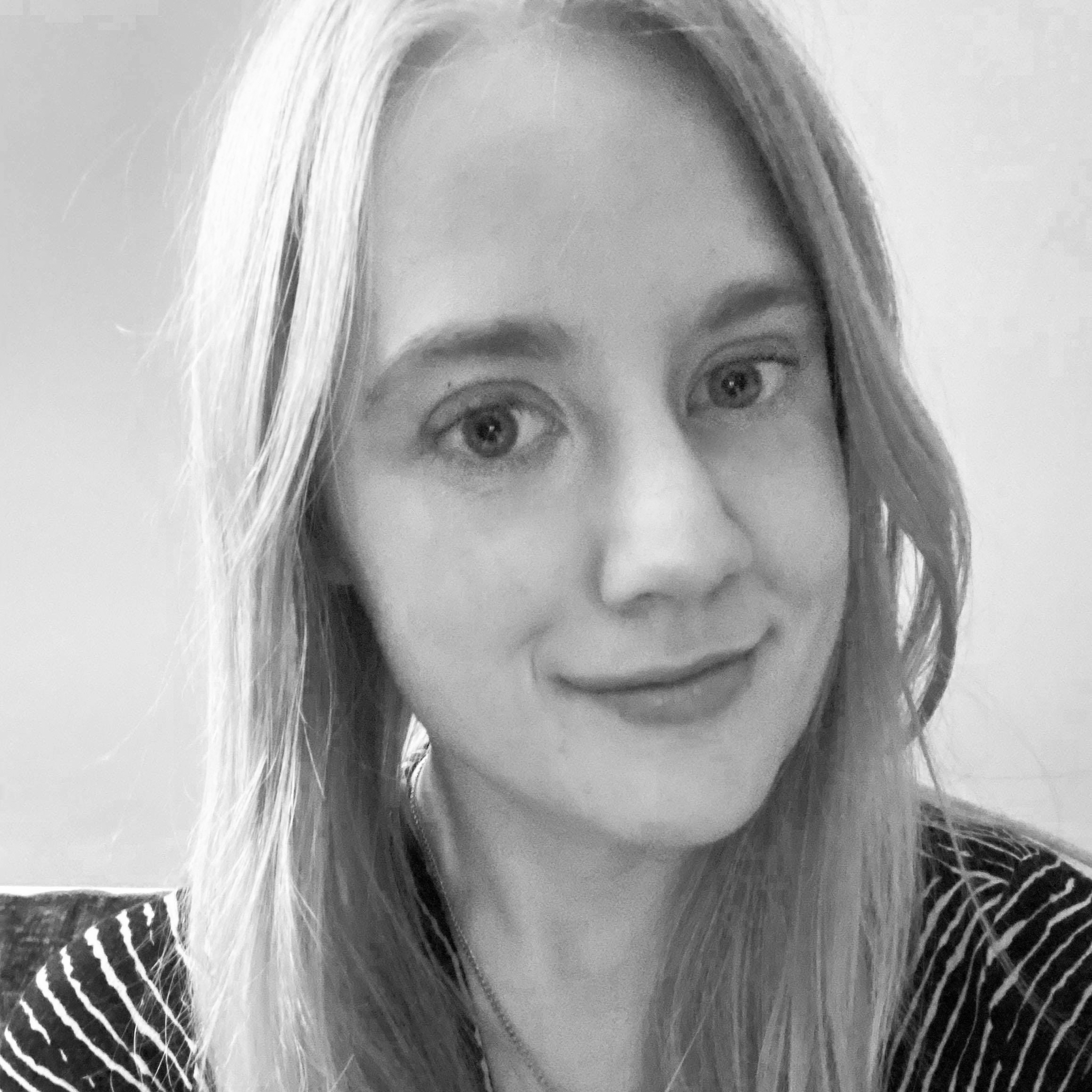 Black and white, head and shoulders portrait of Caroline Butterwick.