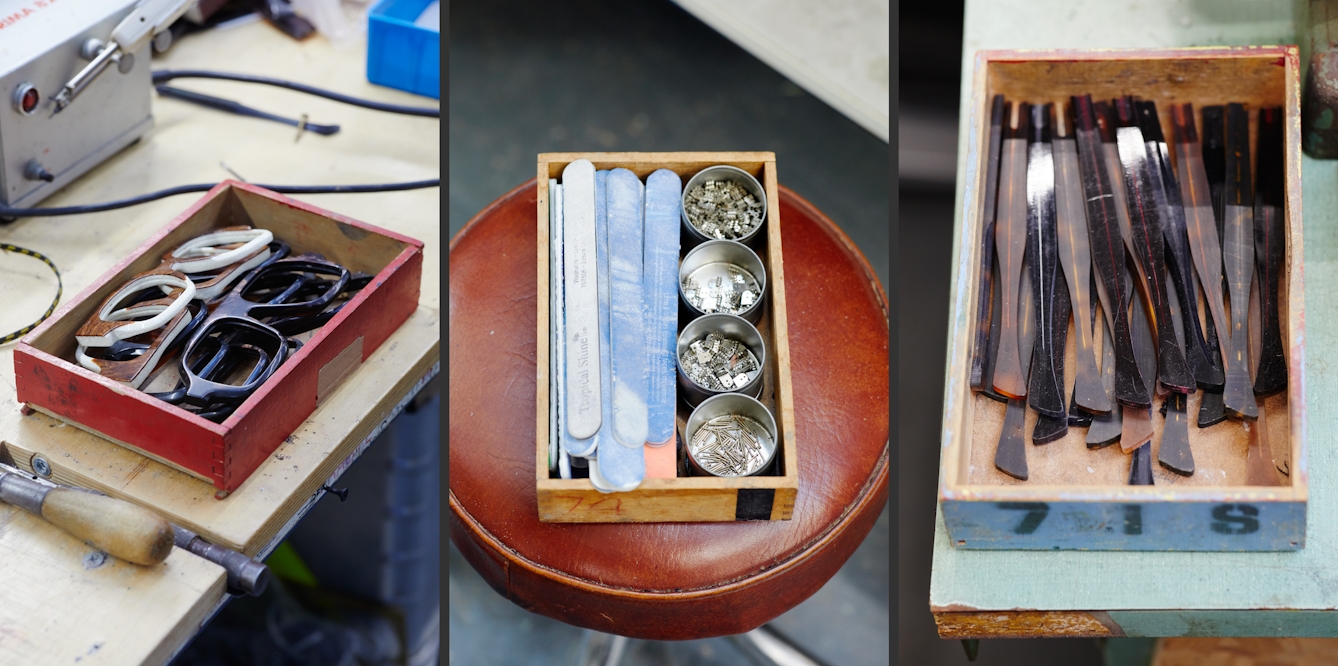 Photographic triptych. Each image shows the component parts needed to manufacture spectacle frames. On the right are a box fill of arms, in the centre us a box full of hinges and on the left is a box containing the front of the glasses, before the arms have been fitted.