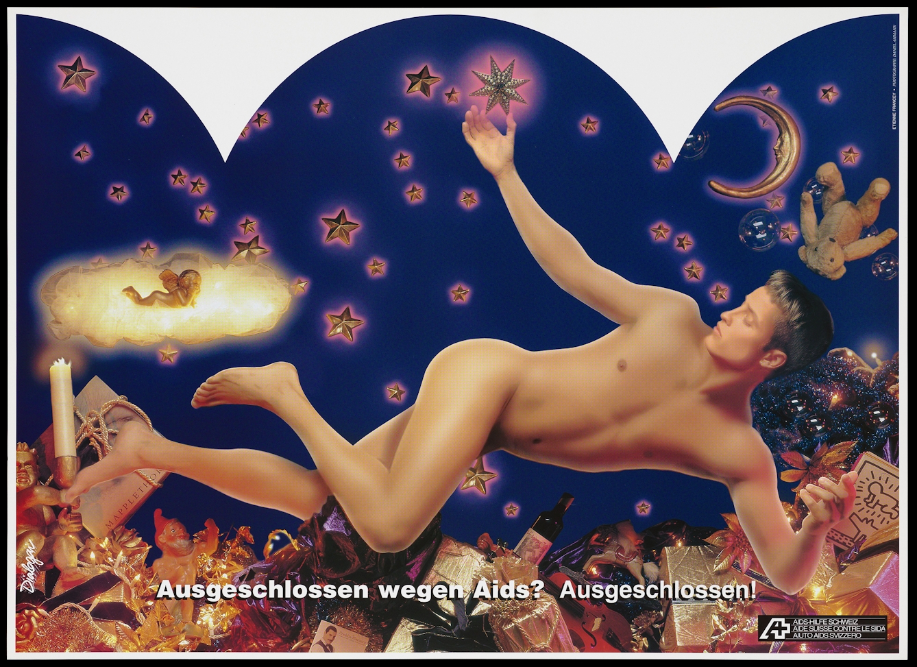Poster print of a naked young man floating in front of a deep blue backgroud of gold stars, moon and cherub. Below him is a profusion of wrapped gifts, wine, candles and baubles including a drawing by Keith Haring, a book by Robert Mapplethorpe and a photograph of Freddy Mercury. The tedxt at the bottom, in German, reads Ausgeshchlossen wegen Aids? Ausgeschlossen!